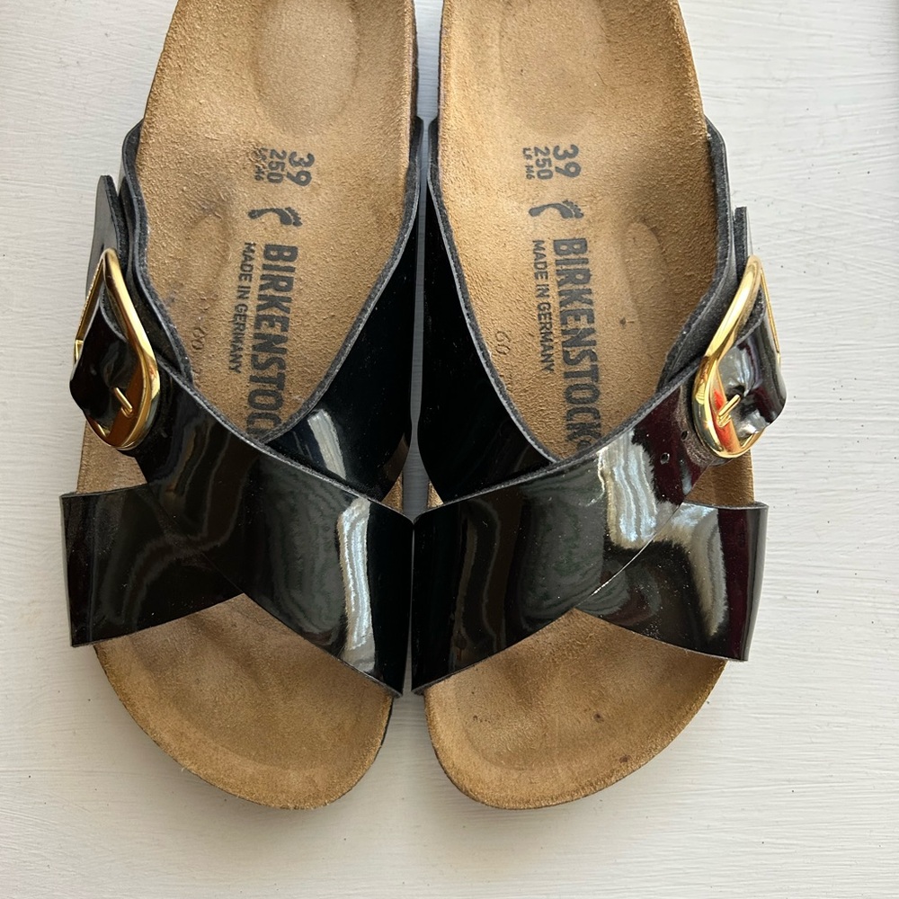 Birkenstock Black Sandals with Gold Buckle